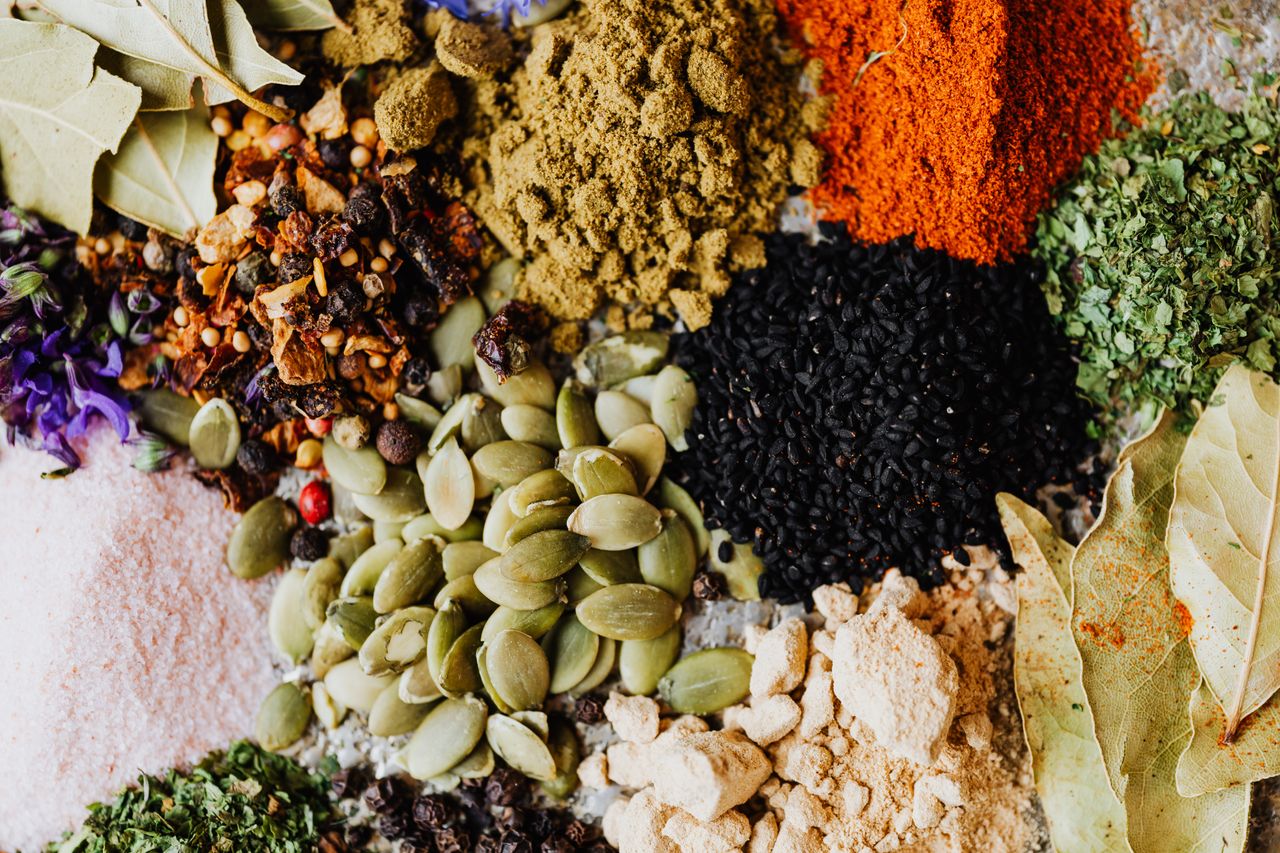 Home Vibrant collection of spices and seeds perfect for culinary backgrounds.